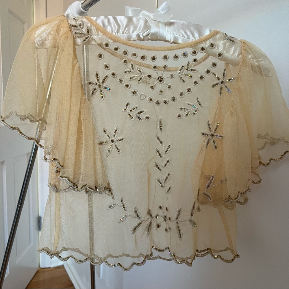 See through Urban Outfitters top with embroidered details